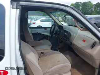 1998 Ford F-150 z VIN 1FTZX1762WNA68542, wystawiony jako IAAI lot #42300548 z przebiegiem 312 931 mil mil oraz . Historia ofert i sprzedaży dostępna na DreamBid. Obrazek 5.