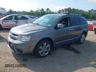 2012 Dodge Journey Crew with VIN 3C4PDCDG9CT199567, listed as a IAAI auction lot 42738030 with 140,864 mi miles and . Bid and sale history available at DreamBid. Image 2.