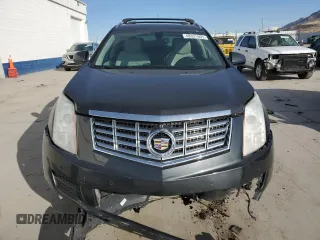 2015 Cadillac SRX Luxury Collection with VIN 3GYFNEE34FS619157, listed as a Copart auction lot 48331665 with 130,477 mi miles and Salvage Title. Bid and sale history available at DreamBid. Image 5.