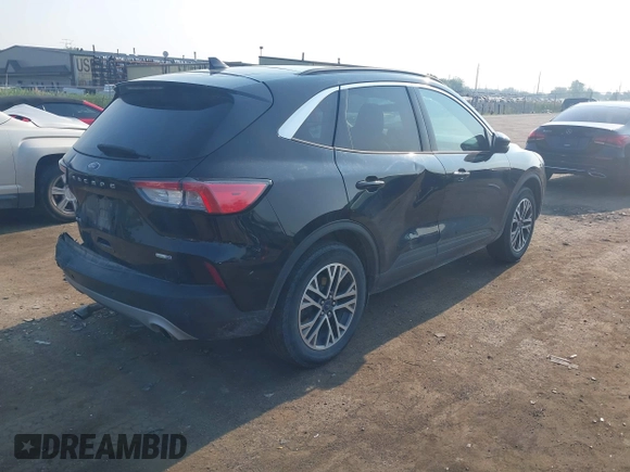 2020 Ford Escape SEL with VIN 1FMCU9H63LUA96861, listed as a IAAI auction lot 42469239 with 59,791 mi miles and . Bid and sale history available at DreamBid. Image 4.