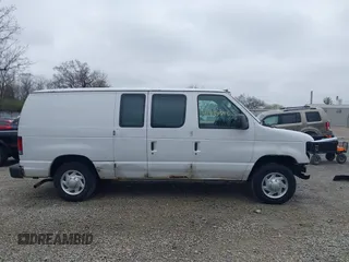 2012 Ford Econoline Cargo Commercial with VIN 1FTNE1EW0CDB10750, listed as a IAAI auction lot 41939696 with 180,042 mi miles. Bid and sale history available at carsss.com. Image 14.