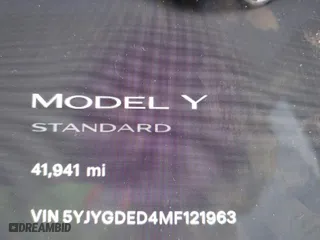 2021 Tesla Model Y Standard Range with VIN 5YJYGDED4MF121963, listed as a IAAI auction lot 41490477 with 41,941 mi miles. Bid and sale history available at carsss.com. Image 7.