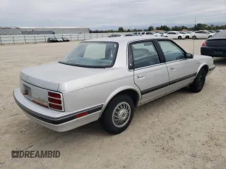 1992 Oldsmobile Cutlass z VIN 1G3AL54N7N6363365, wystawiony jako Copart lot #76144254 z przebiegiem 52 896 mil mil oraz Tytuł czysty. Historia ofert i sprzedaży dostępna na DreamBid. Obrazek 3.