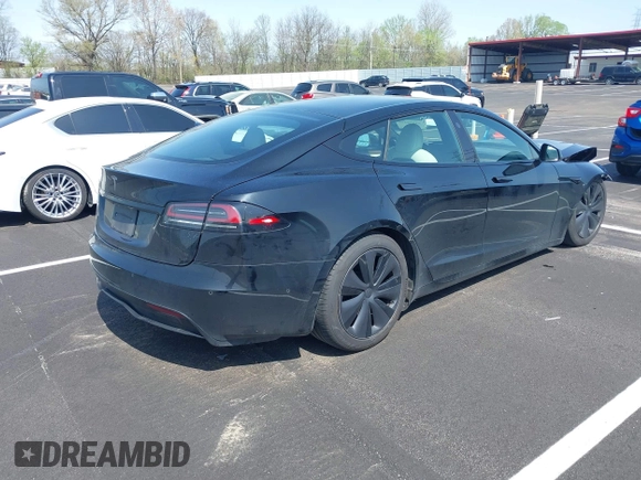 2022 Tesla Model S z VIN 5YJSA1E56NF490064, wystawiony jako IAAI lot #41858477 z przebiegiem Nie podano mil oraz . Historia ofert i sprzedaży dostępna na DreamBid. Obrazek 4.