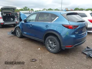 2017 Mazda CX-5 Touring z VIN JM3KFBCL9H0224962, wystawiony jako IAAI lot #42312104 z przebiegiem Nie podano mil oraz . Historia ofert i sprzedaży dostępna na DreamBid. Obrazek 3.