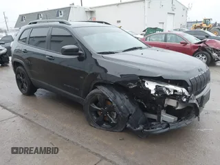 2019 Jeep Cherokee Latitude Plus with VIN 1C4PJLLB8KD396345, listed as a IAAI auction lot 41201994 with 63,947 mi miles. Bid and sale history available at carsss.com. Image 1.