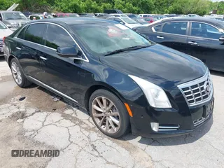 2013 Cadillac XTS Premium with VIN 2G61S5S39D9144177, listed as a IAAI auction lot 42111910 with 69,830 mi miles. Bid and sale history available at carsss.com. Image 1.