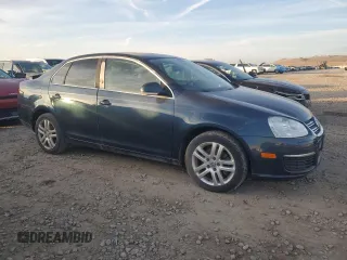 2007 Volkswagen Jetta z VIN 3VWDG71K27M010409, wystawiony jako Copart lot #84155424 z przebiegiem 140 665 mil mil oraz Czysty tytuł • Clean title. Historia ofert i sprzedaży dostępna na DreamBid. Obrazek 4.