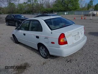 2002 Hyundai Accent GL with VIN KMHCG45C92U347708, listed as a IAAI auction lot 42137086 with 73,271 mi miles. Bid and sale history available at carsss.com. Image 3.