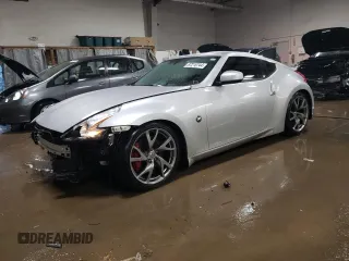 2014 Nissan 370Z Nismo with VIN JN1AZ4EH2EM636132, listed as a Copart auction lot 87218744 with 39,254 mi miles and Salvage Title. Bid and sale history available at DreamBid. Image 1.