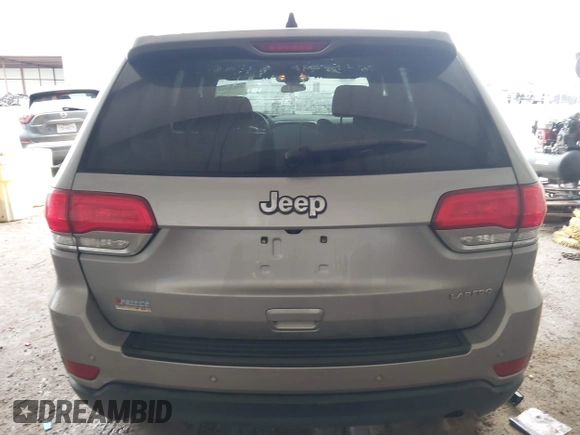 2018 Jeep Grand Cherokee Laredo E with VIN 1C4RJEAG1JC275356, listed as a IAAI auction lot 42150422 with 69,720 mi miles and . Bid and sale history available at DreamBid. Image 16.