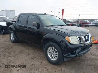 2015 Nissan Frontier SV with VIN 1N6AD0ER7FN708707, listed as a IAAI auction lot 41513764 with 64,146 mi miles and . Bid and sale history available at DreamBid. Image 1.