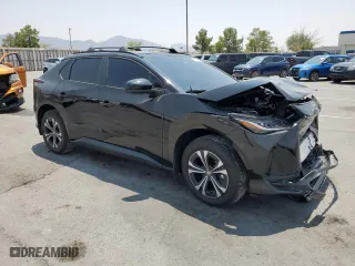 2024 Toyota bZ4X XLE with VIN JTMAAAAAXRA037109, listed as a Copart auction lot 64773014 with 1,232 mi miles and Salvage Title. Bid and sale history available at carsss.com. Image 4.