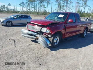 2002 Ford F-150 XL with VIN 1FTRX17W62NB13010, listed as a IAAI auction lot 41689466 with 208,160 mi miles. Bid and sale history available at carsss.com. Image 2.