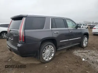 2017 Cadillac Escalade Platinum z VIN 1GYS4DKJ5HR186324, wystawiony jako Copart lot #53880955 z przebiegiem 97 166 mil mil oraz Szkoda całkowita • Salvage title. Historia ofert i sprzedaży dostępna na DreamBid. Obrazek 3.