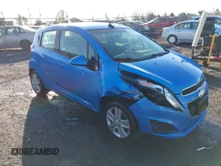 2013 Chevrolet Spark LT with VIN KL8CD6S94DC504483, listed as a IAAI auction lot 41919287 with 124,670 mi miles. Bid and sale history available at carsss.com. Image 1.
