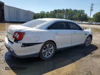 2011 Ford Taurus Limited with VIN 1FAHP2FW8BG141839, listed as a Copart auction lot 56594285 with 121,236 mi miles and Salvage title. Bid and sale history available at DreamBid. Image 3.
