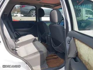 2003 Ford Escape XLT Popular 2 with VIN 1FMCU93163KB78008, listed as a IAAI auction lot 41660779 with 153,898 mi miles. Bid and sale history available at carsss.com. Image 8.