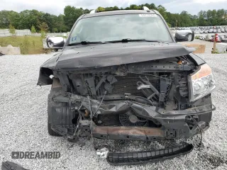 2012 Nissan Armada Platinum z VIN 5N1AA0NC4CN613049, wystawiony jako Copart lot #64414564 z przebiegiem 143 009 mil mil oraz Szkoda całkowita • Salvage title. Historia ofert i sprzedaży dostępna na DreamBid. Obrazek 5.