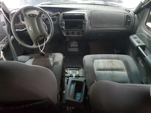 2005 Ford Explorer Sport Trac XLS with VIN 1FMDU77KX5UB63725, listed as a Copart auction lot 49386155 with 165,293 mi miles and Salvage title. Bid and sale history available at DreamBid. Image 8.