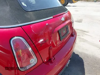 2006 MINI Convertible S with VIN WMWRH33586TK59381, listed as a IAAI auction lot 42165953 with 94,109 mi miles and . Bid and sale history available at DreamBid. Image 6.