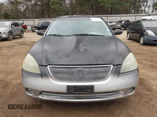 2002 Nissan Altima SE with VIN 1N4BL11D52C260747, listed as a IAAI auction lot 41733376 with 151,750 mi miles. Bid and sale history available at carsss.com. Image 6.