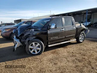 2013 Nissan Titan SV with VIN 1N6AA0EC1DN310572, listed as a Copart auction lot 50017235 with 114,349 mi miles and Salvage title. Bid and sale history available at DreamBid. Image 1.