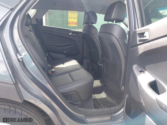 2018 Hyundai Tucson Value with VIN KM8J3CA24JU646807, listed as a IAAI auction lot 41960629 with 117,646 mi miles. Bid and sale history available at carsss.com. Image 8.
