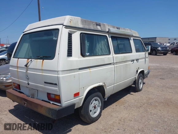1991 Volkswagen Vanagon GL with VIN WV2ZB0258MG006802, listed as a IAAI auction lot 41969597 with 241,953 mi miles and . Bid and sale history available at DreamBid. Image 4.