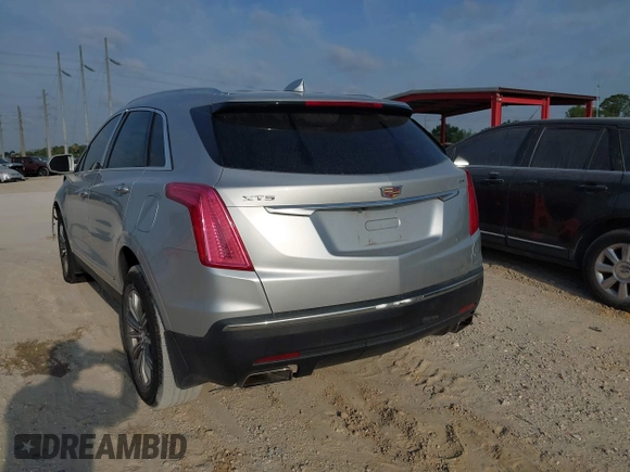 2017 Cadillac XT5 Luxury FWD with VIN 1GYKNBRS8HZ205769, listed as a IAAI auction lot 41865624 with 112,767 mi miles. Bid and sale history available at carsss.com. Image 3.