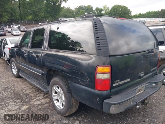 2001 Chevrolet Suburban LS z VIN 1GNEC16T21J217198, wystawiony jako IAAI lot #41779416 z przebiegiem 306 172 mil mil oraz . Historia ofert i sprzedaży dostępna na DreamBid. Obrazek 3.