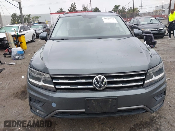 2018 Volkswagen Tiguan SEL z VIN 3VV3B7AX4JM005780, wystawiony jako IAAI lot #41880005 z przebiegiem 149 578 mil mil oraz . Historia ofert i sprzedaży dostępna na DreamBid. Obrazek 12.