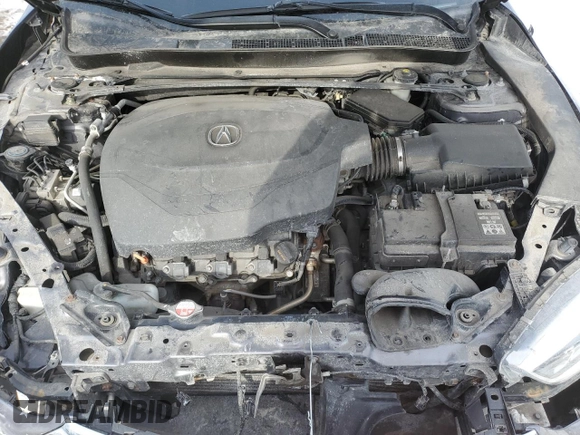 2018 Acura TLX Technology z VIN 19UUB3F5XJA802956, wystawiony jako Copart lot #46687825 z przebiegiem Nie podano mil oraz Szkoda całkowita • Salvage title. Historia ofert i sprzedaży dostępna na DreamBid. Obrazek 11.