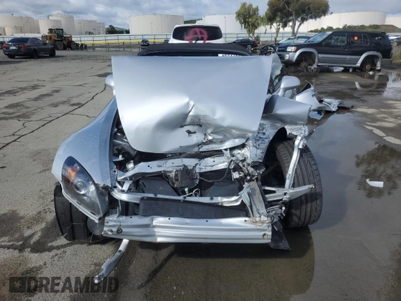 2005 Honda S2000 с VIN JHMAP21415S001004, выставлен на аукционе Copart как лот 48741805 с пробегом 54 987 миль миль и Списание • Salvage title. История ставок и продаж доступна на DreamBid. Изображение 5.