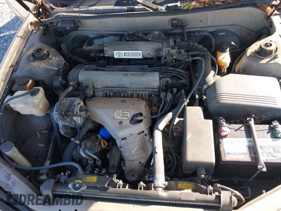 1994 Toyota Camry LE with VIN 4T1SK12E9RU351895, listed as a IAAI auction lot 41239573 with 184,866 mi miles. Bid and sale history available at carsss.com. Image 10.