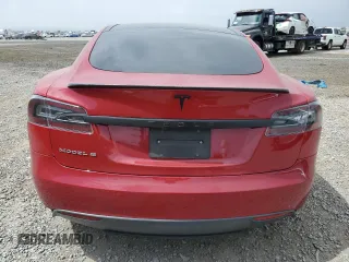 2016 Tesla Model S 90D with VIN 5YJSA1E42GF127593, listed as a Copart auction lot 52450495 with 144,151 mi miles and Salvage title. Bid and sale history available at DreamBid. Image 6.