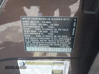 2014 Volkswagen Touareg Sport with VIN WVGEF9BP7ED003525, listed as a IAAI auction lot 41868307 with 74,379 mi miles and . Bid and sale history available at DreamBid. Image 9.
