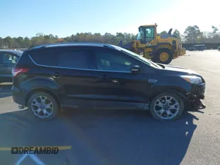 2016 Ford Escape Titanium with VIN 1FMCU0JX3GUA90420, listed as a IAAI auction lot 41850537 with 115,770 mi miles. Bid and sale history available at carsss.com. Image 13.