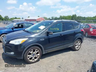 2015 Ford Escape Titanium with VIN 1FMCU9J96FUC01790, listed as a IAAI auction lot 42844336 with 133,005 mi miles and . Bid and sale history available at DreamBid. Image 14.