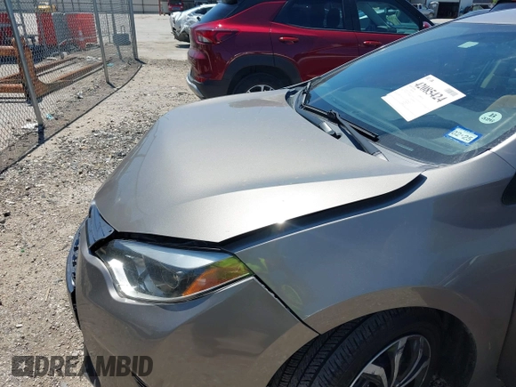 2015 Toyota Corolla L with VIN 5YFBURHE1FP312604, listed as a IAAI auction lot 42085424 with 123,379 mi miles and . Bid and sale history available at DreamBid. Image 19.