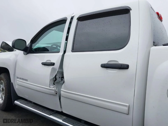 2012 Chevrolet Silverado 1500 LT with VIN 3GCPKSE72CG109571, listed as a IAAI auction lot 40809226 with 124,270 mi miles. Bid and sale history available at carsss.com. Image 14.