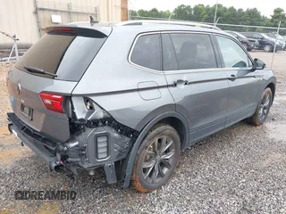 2023 Volkswagen Tiguan SE with VIN 3VVNB7AX4PM042409, listed as a IAAI auction lot 42627800 with 29,016 mi miles and . Bid and sale history available at DreamBid. Image 4.
