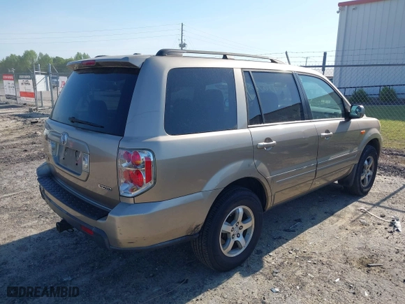 2006 Honda Pilot EX-L with RES with VIN 2HKYF186X6H525613, listed as a IAAI auction lot 42077659 with 171,124 mi miles. Bid and sale history available at carsss.com. Image 4.