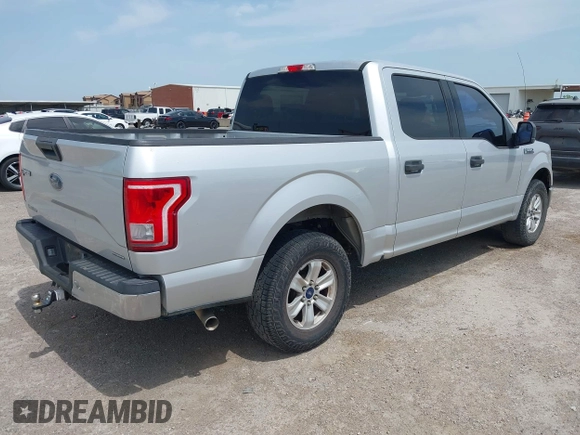 2015 Ford F-150 XL with VIN 1FTEW1CF3FKD17617, listed as a IAAI auction lot 41976415 with 216,415 mi miles and . Bid and sale history available at DreamBid. Image 4.