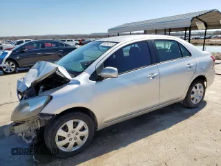 2012 Toyota Yaris with VIN JTDBT4K33C1416217, listed as a Copart auction lot 46714115 with 212,894 mi miles and Salvage Title. Bid and sale history available at DreamBid. Image 1.