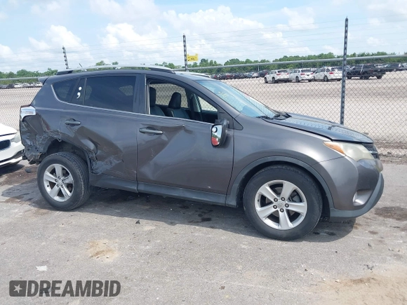 2013 Toyota RAV4 XLE with VIN 2T3WFREV0DW051372, listed as a IAAI auction lot 42310212 with 206,471 mi miles and . Bid and sale history available at DreamBid. Image 14.