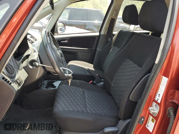 2009 Suzuki SX4 Touring AWD with VIN JS2YB417696200378, listed as a Copart auction lot 62911494 with 176,257 mi miles and Salvage Title. Bid and sale history available at DreamBid. Image 7.