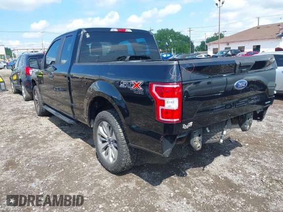 2018 Ford F-150 XL with VIN 1FTEX1EP5JKG01004, listed as a IAAI auction lot 42583232 with 123,258 mi miles and . Bid and sale history available at DreamBid. Image 3.