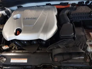 2014 Hyundai Sonata Hybrid with VIN KMHEC4A42EA117405, listed as a IAAI auction lot 41157185 with 74,225 mi miles. Bid and sale history available at carsss.com. Image 10.