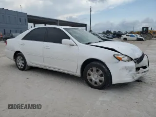 2004 Toyota Camry LE with VIN 4T1BE32K14U285392, listed as a Copart auction lot 48312415 with 121,629 mi miles and Salvage Title. Bid and sale history available at DreamBid. Image 4.